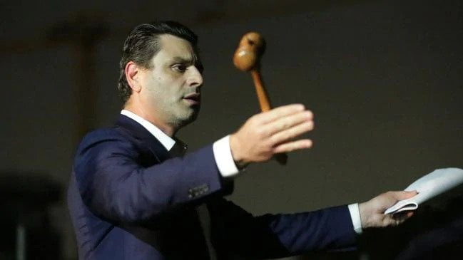 Auctioneer