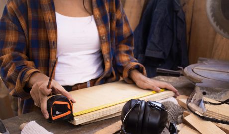 Photo by Los Muertos Crew: https://www.pexels.com/photo/close-up-photo-of-woman-measuring-a-wood-plank-8447802/