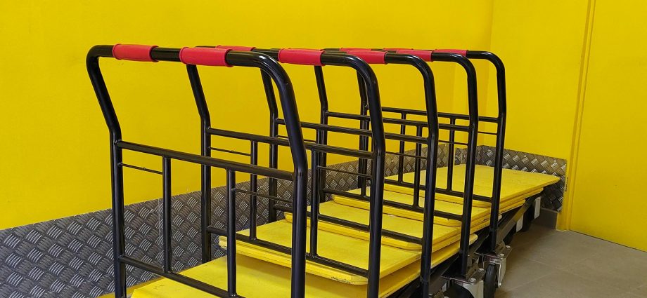 Photo by Renee B: https://www.pexels.com/photo/bright-yellow-room-with-industrial-dollies-29640307/